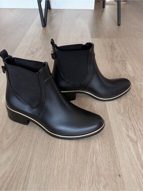 kate spade Black Chelsea Rain Boots with Gold Accent